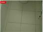 Re grouting cloakroom floor