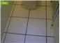Re grouting cloakroom floor